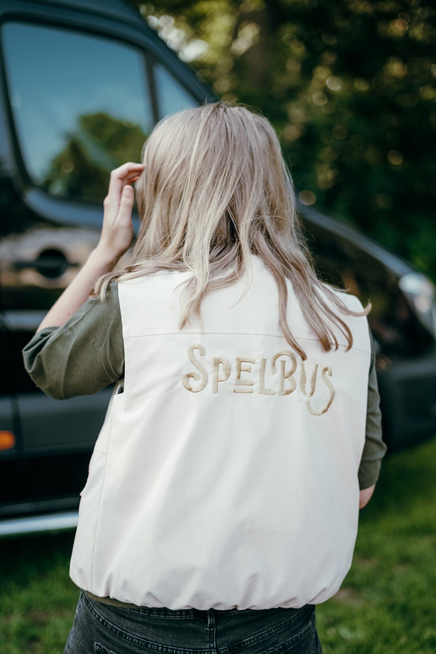 Het Spelbus-hesje van de bordspelhost